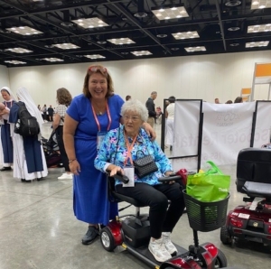 Customer enjoying a mobility scooter rental at an Indianapolis convention
